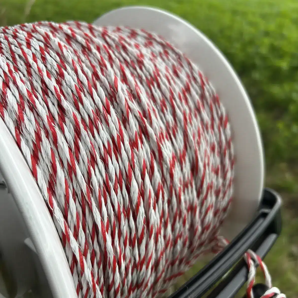 close up of Hotline Electric FEncing Reel with twine