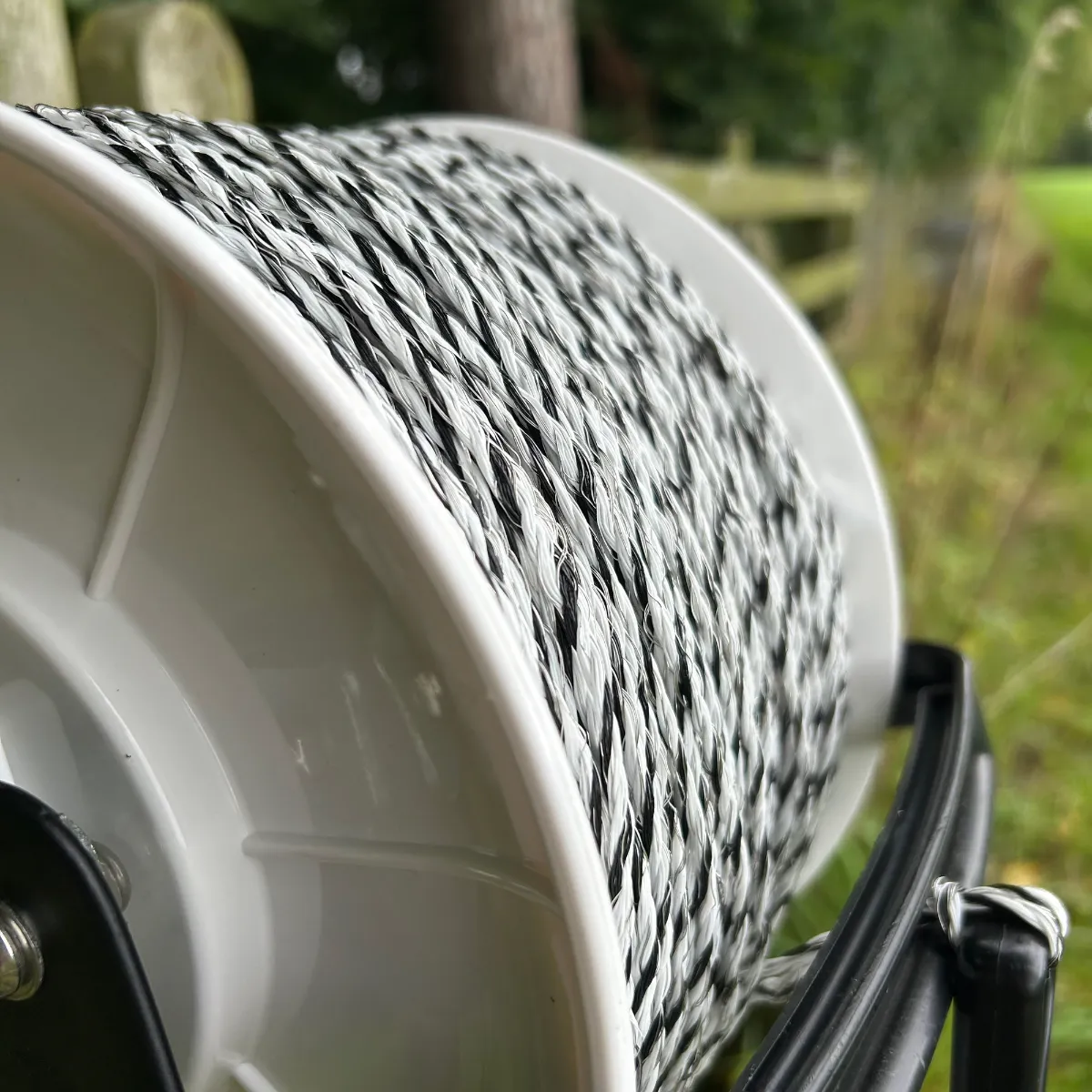 Close up showing just how much twine is on a Hotline Geared reel