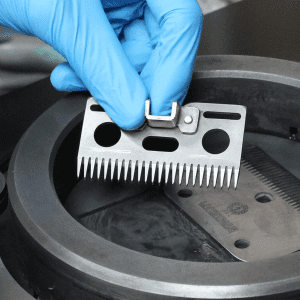 Horse clipper blade sharpening using a lapping machine