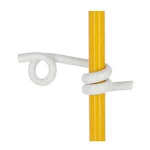 strong plastic insulator on electric fencing fibreglass post for sheep and cattle grazing